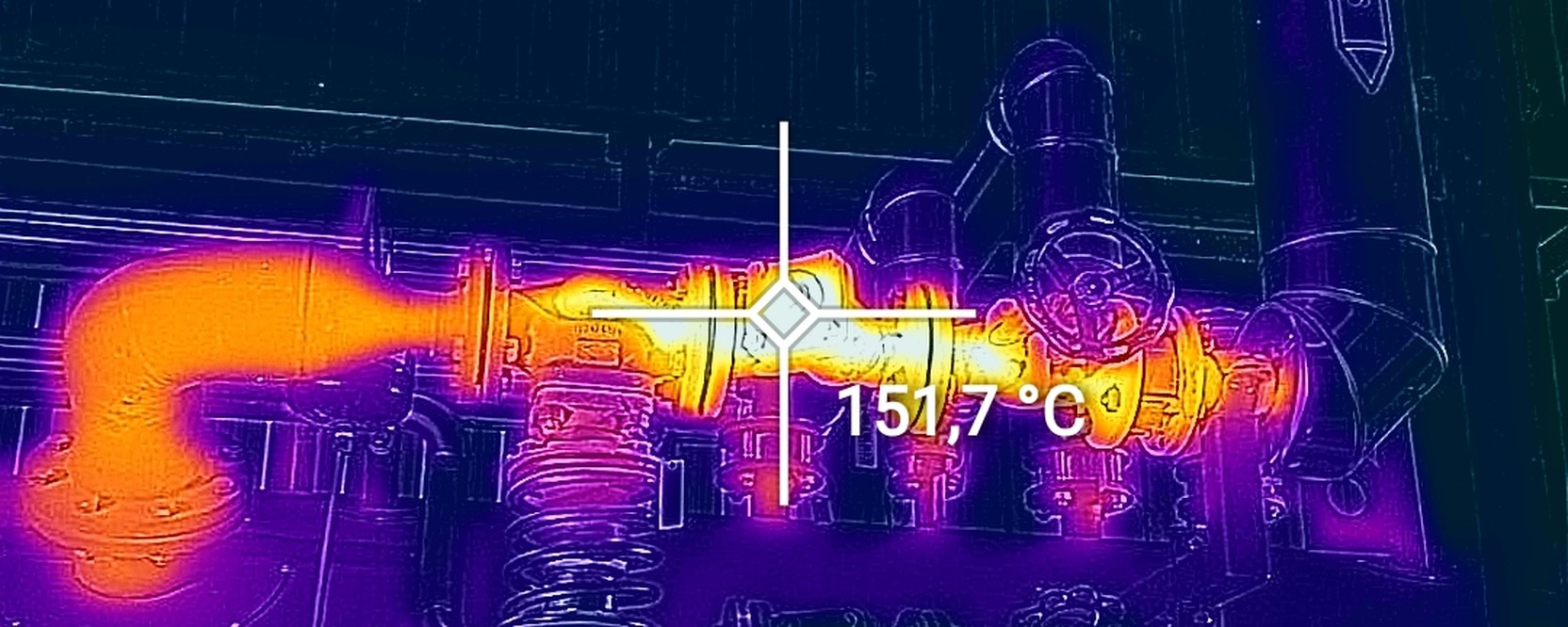 Thermogram of a bare feedwater manifold and valves in a boiler house, spot reading 151.7 degrees Celsius